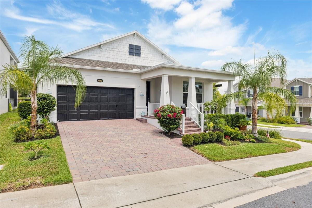 ***ASSUMABLE VA MORTGAGE AT A 5.375 INTEREST RATE*** Absolute model condition—and that’s not said lightly. From the moment you arrive, the charm and care put into this home are undeniable. A cozy front porch with ample seating and attractive brick pavers sets the tone, leading to an upgraded 9-foot leaded glass front door that opens into a meticulously maintained interior.
The upgraded gourmet kitchen is a standout, featuring 42-inch cabinets with crown moulding, a designer tile backsplash, and an upgraded stainless steel hood. A large island with a farmhouse sink, built-in cabinet garbage container, quartz countertops, and upgraded cabinet pulls make this kitchen both functional and beautiful. There’s also a stylish glass pantry door and pre-wiring for pendant lighting above the island, perfect for highlighting this stunning space.
Throughout the kitchen, family room, dining area, and hallways, you’ll find expansive wood-look tile flooring, adding warmth and continuity. Upgraded light fixtures and added recessed lighting throughout the home create a bright and welcoming atmosphere.
The primary suite offers a spacious bedroom with dual closets—one of which provides direct access to the laundry room for added convenience. The ensuite bathroom includes a custom-tiled shower with a built-in bench and shelf, raised dual vanities, and a large garden soaking tub for a true spa-like experience.
The exterior is just as impressive. The yard has been meticulously cared for, with thoughtfully upgraded plants and flowers that enhance the home's curb appeal and create a vibrant, welcoming outdoor space. The screened-in back porch with brick pavers offers a peaceful retreat for relaxing or entertaining. The home sits on a quiet corner lot and is pre-wired for a security system for added peace of mind. The garage features large storage racks that will remain with the home, providing excellent organization options.
This home has been thoughtfully upgraded and maintained to model condition, offering an exceptional living experience inside and out. Homes like this don’t come around often—schedule your private showing today.