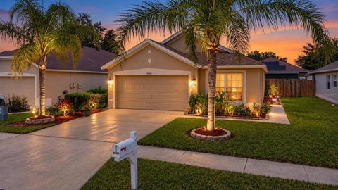 Photo of 24443 Summer Wind Ct, Lutz, FL 33559 (MLS # TB8541019)