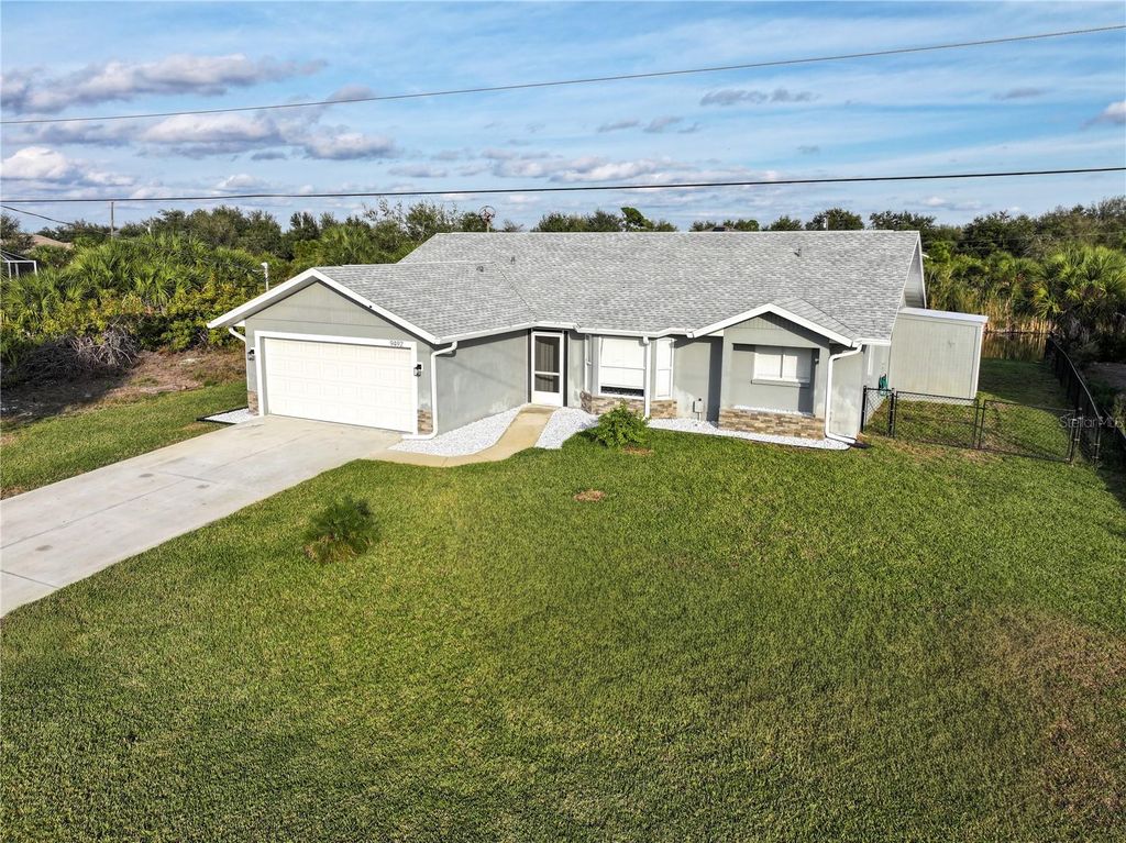 Photo of 9492 Galaxie Circle, Port Charlotte, FL 33981 (MLS # D6144928)
