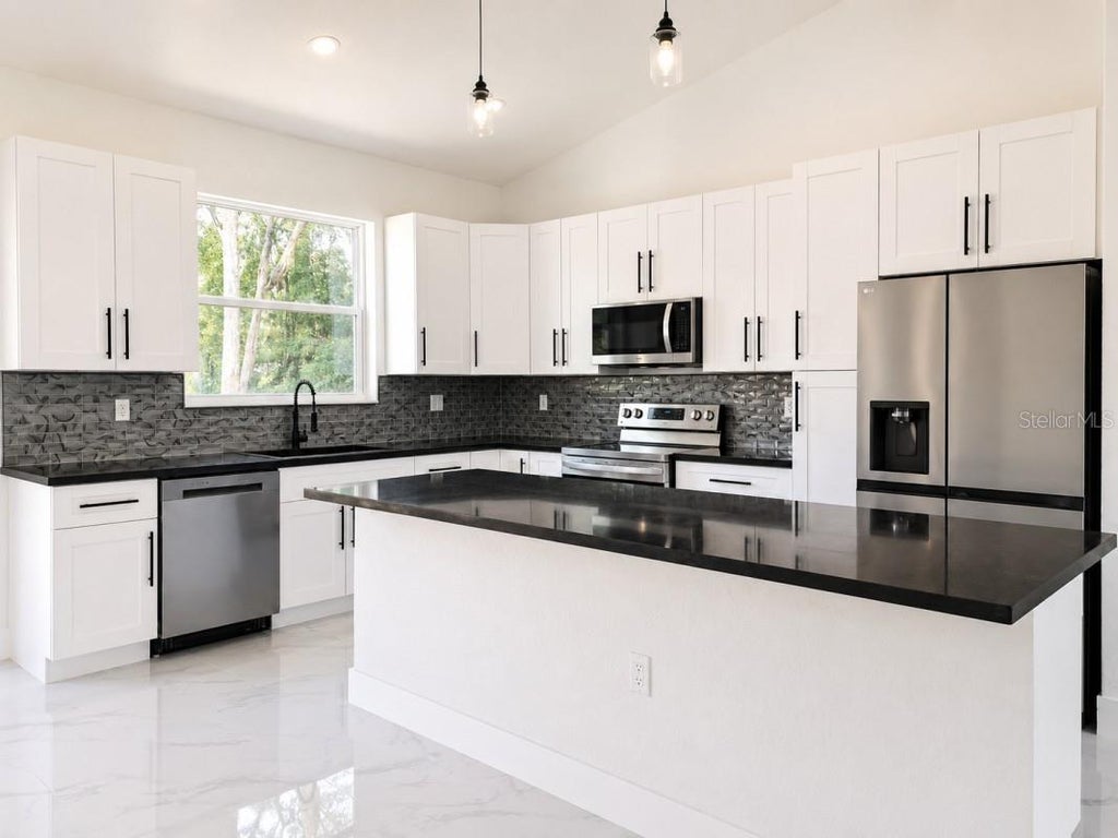 Photo of 3476 SE Hwy 484, Belleview, FL 34420 (MLS # A4697533)