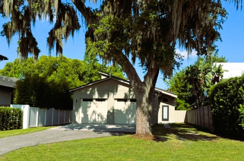One or more photo(s) has been virtually staged. This beautiful 4-bedroom, 3-bathroom home in Winter Park's sought-after Virginia Heights neighborhood offers 3,204 square feet of comfortable living space on a private 0.21-acre lot. The property underwent extensive addition and renovation in 2020, featuring stunning wood floors throughout and a spacious kitchen complete with a bar, center island, and wine fridge.
The home's character shines through unique details like authentic New Orleans 100-year-old ironwork on the staircase, adding historical charm to this modern residence. The main floor flows seamlessly, while upstairs you'll find three bedrooms. A large game room provides flexible space that could easily serve as an in-law suite.
Recent updates ensure worry-free living with new drywall, insulation, electrical, and plumbing systems installed. The roof was replaced in 2021, and the home features three newer air conditioning units plus water heaters that are just 2-4 years old. A new sewer line to the street was installed in 2009.
Outside, you'll discover a well-designed courtyard leading to an amazing pool and backyard perfect for entertaining or relaxing. The property includes a gas line and plenty of parking space.
The location offers the best of Winter Park living. You're just steps from Lake Virginia with exclusive access to College Point, a secluded deeded lakefront area reserved for Virginia Heights residents only. This beautiful lakefront spot overlooks Rollins College and includes a dock for launching kayaks or canoes.
Daily conveniences are nearby with Park Avenue's shops and restaurants within walking distance. The home provides quick access to downtown Winter Park, Winter Park Village, US 17-92, and Mead Botanical Garden. Families will appreciate the proximity to highly-rated Audubon K-8 and Winter Park High School, both just moments away.
This property perfectly combines privacy, luxury, and convenience in one of Winter Park's most desirable neighborhoods.