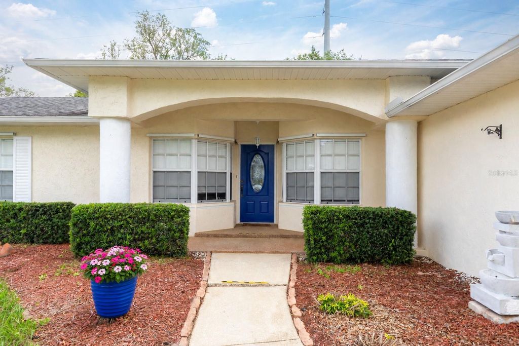 Photo of 2076 S Parkton Drive, Deltona, FL 32725 (MLS # O6409853)