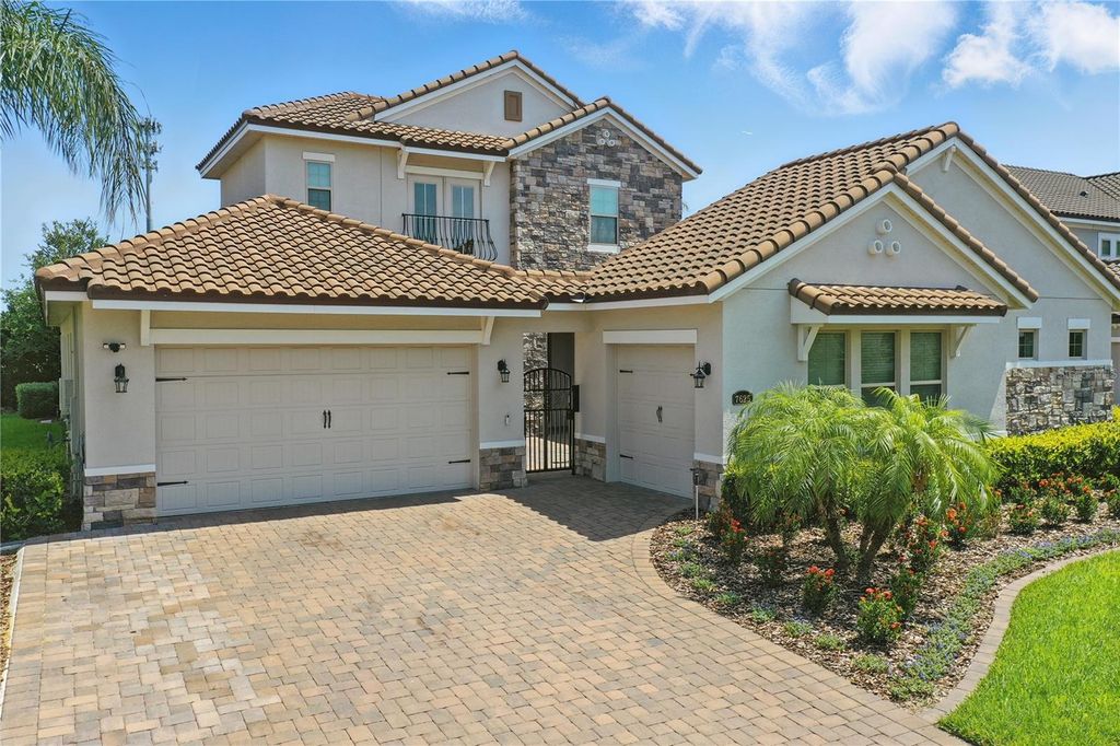 Photo of 7625 Blue Quail Lane, Orlando, FL 32835 (MLS # O6350698)