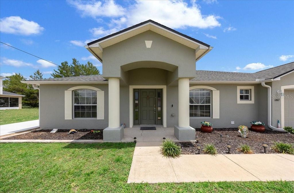 Photo of 12887 SW 31st Avenue Road, Ocala, FL 34473 (MLS # OM724768)