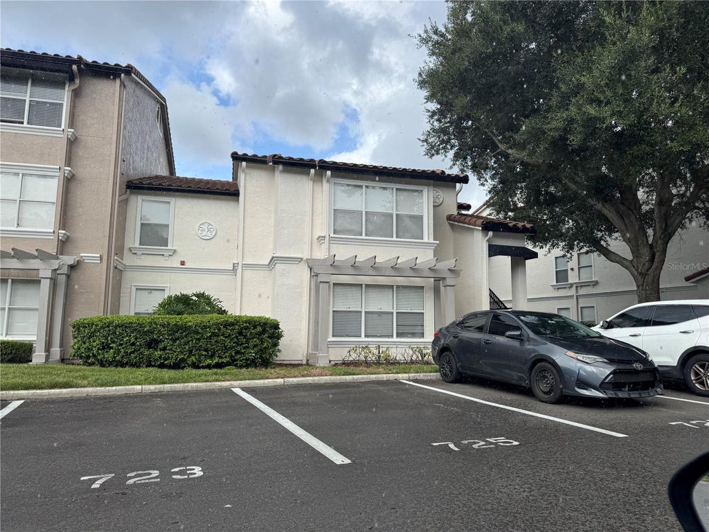 Photo of 5128 Conroy Road #718, Orlando, FL 32811 (MLS # O6438085)