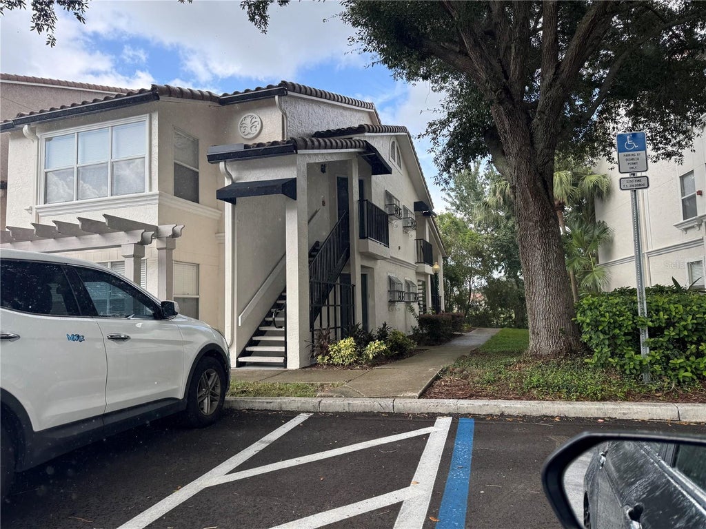 Photo of 5128 Conroy Road #718, Orlando, FL 32811 (MLS # O6438085)