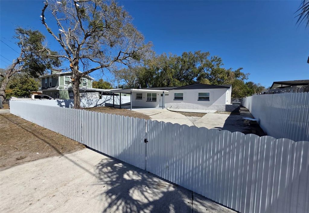 Photo of 10415 N 27th Street, Tampa, FL 33612 (MLS # TB8477989)