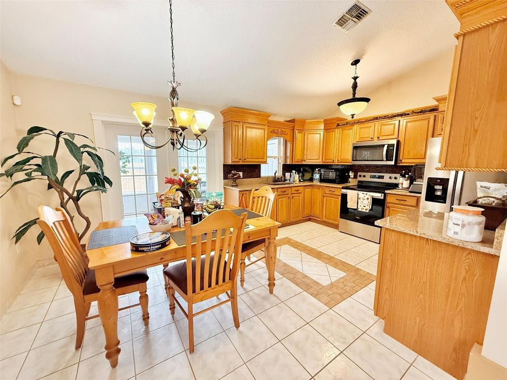 Photo of 12805 Parkbury Drive, Orlando, FL 32828 (MLS # TB8474711)