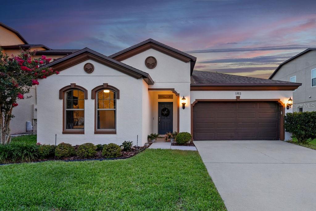 SHOWS LIKE A MODEL! Expect to be impressed with this beautifully appointed, immaculate and move-
in ready home in the desirable Reserve at Minneola community. THOUSANDS invested in recent quality
updates: (1) new quartz kitchen counters (June, 2025), (2) new kitchen sink and cabinet hardware (June,
2025), (3) new dishwasher (June, 2025), (4) freshly painted and updated laundry room, and (5) new
desk/workstation added to alcove off kitchen. Your positive experience starts with great curb appeal –
meticulously manicured lawn and lush landscaping greet you upon arrival. Step inside the long entry hall
and walk straight back to the heart of the home where you’ll find your common living area – open
living/dining space and kitchen. Gourmet style kitchen boasts quartz counters, island w/breakfast bar,
abundant raised panel cabinetry, attractive tile backsplash, reverse osmosis system, walk-in pantry and
both recessed and pendant lighting. The living room makes a great gathering space, and there’s direct
access here to the covered back porch. Split bedroom plan with primary suite in the back – ideal for
privacy. Bedroom is large enough for a sitting area. Don’t forget to look up and admire the stylish
tray/coffered ceiling! The ensuite bath features a split vanity layout, and shower w/built-in bench seat
and multiple shower heads. The secondary bedrooms are off the front entry hall near the front and are
spacious enough to accommodate desks, perfect for those working from or studying at home. Out back,
you’ll appreciate having a covered porch – perfect spot for relaxing or entertaining. The backyard is fully
fenced and is dotted with trees, giving the entire backyard a private oasis feel. Overall great location –
the Reserve at Minneola offers residents two pools, one resort style and one private (for adults) – only a
5 min. walk to both! You are also a short drive to essential shopping/major roadways (a Publix shopping
center and the Florida turnpike entrance are only 1 mile away) and, for sports enthusiasts, there’s a
sports complex just outside the community. This home SHINES, both inside and out. Come see all that
makes it so special!