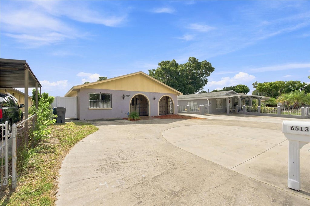 Photo of 6513 N Manhattan Avenue, Tampa, FL 33614 (MLS # TB8532926)