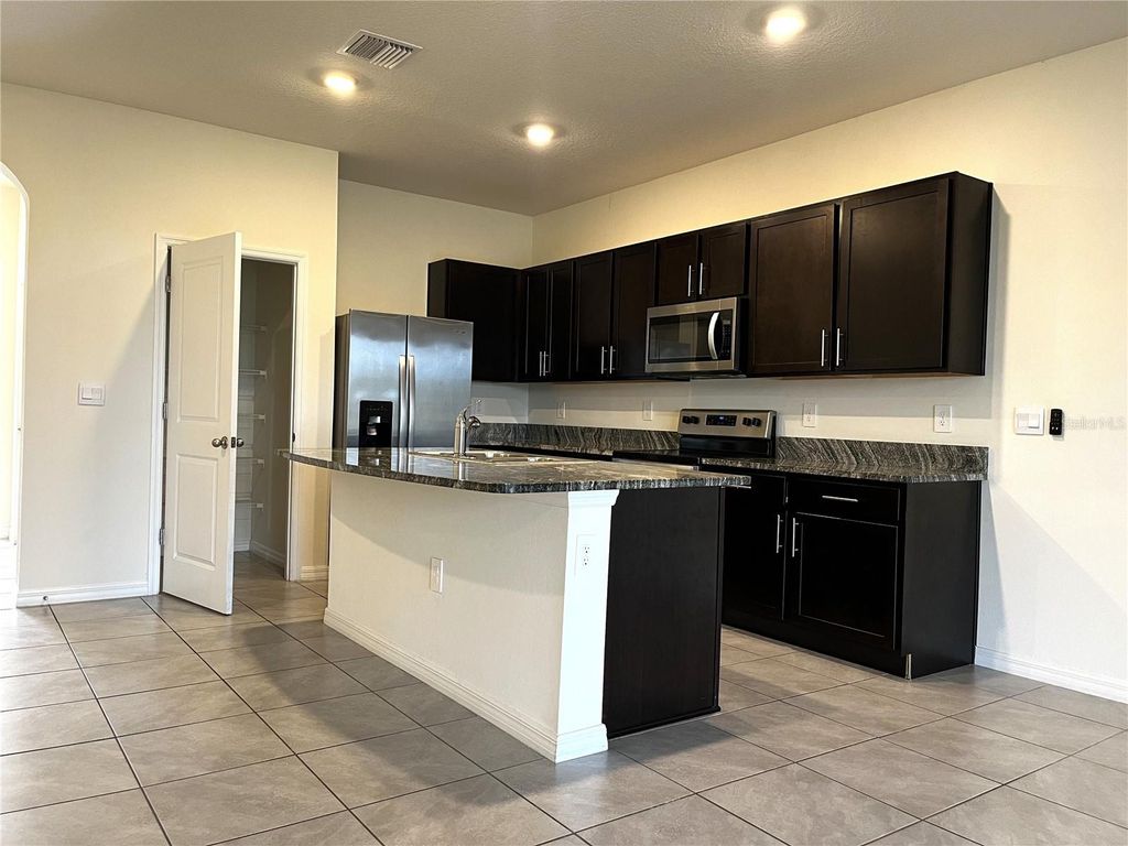 Photo of 8864 Milestone Drive, Sarasota, FL 34238 (MLS # A4691627)