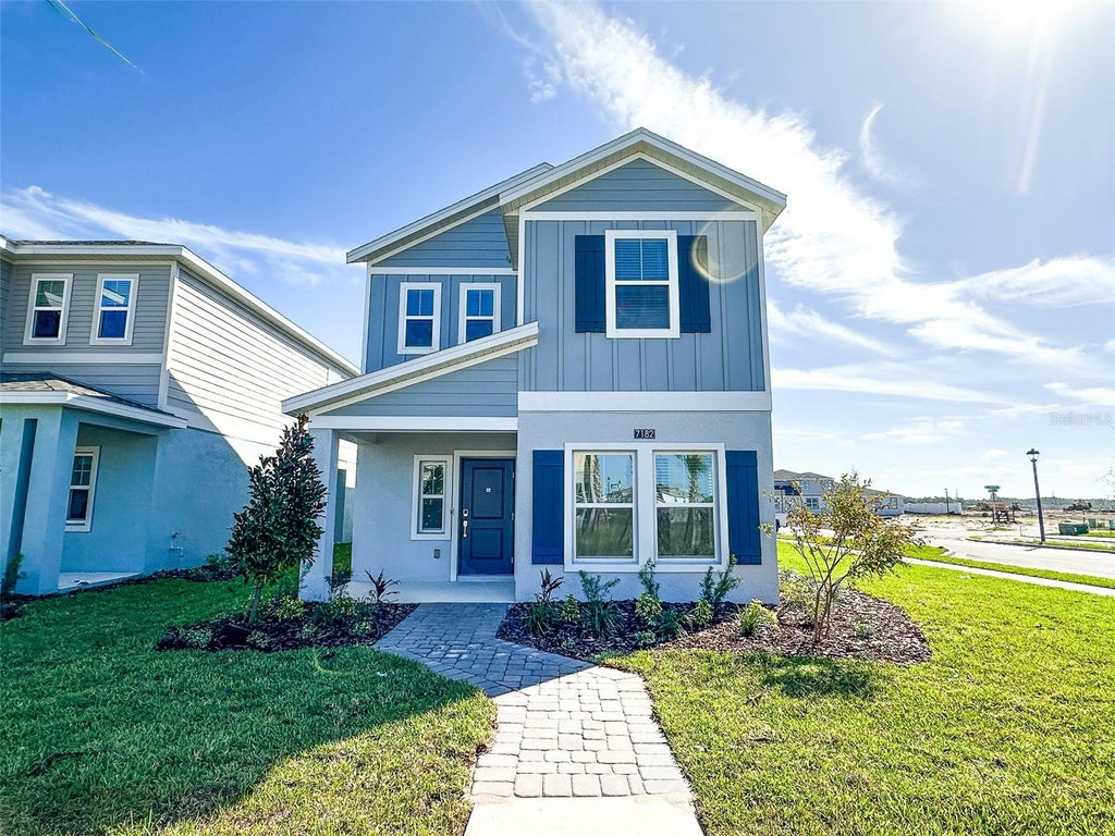 Photo of 7182 Summer Ivy Alley, Orlando, FL 32829 (MLS # O6452792)