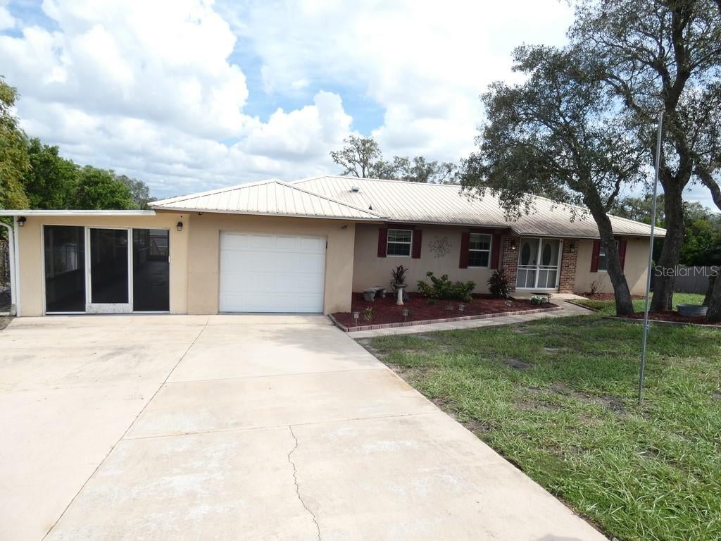 Photo of 7211 Tarrytown Drive, Spring Hill, FL 34606 (MLS # W7889767)