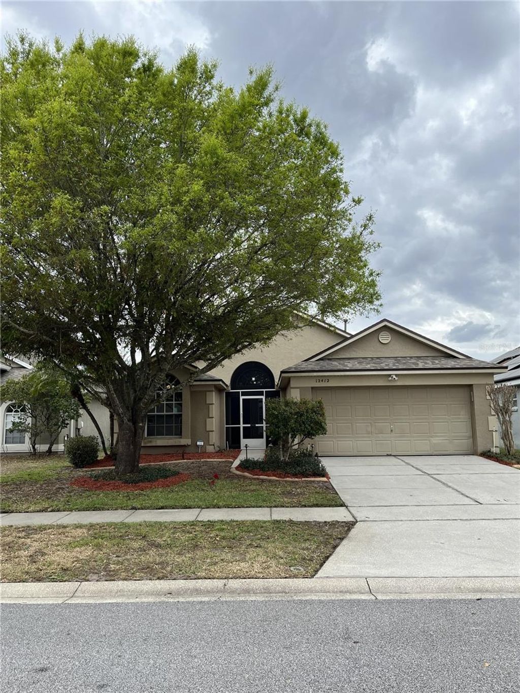 Photo of 12412 Castlemain Trail, Orlando, FL 32828 (MLS # O6386474)