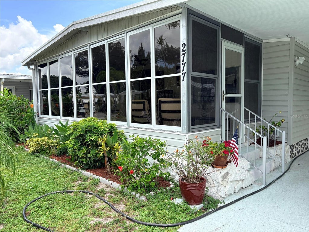 Photo of 2777 Indianwood Drive, North Fort Myers, FL 33917 (MLS # A4700849)