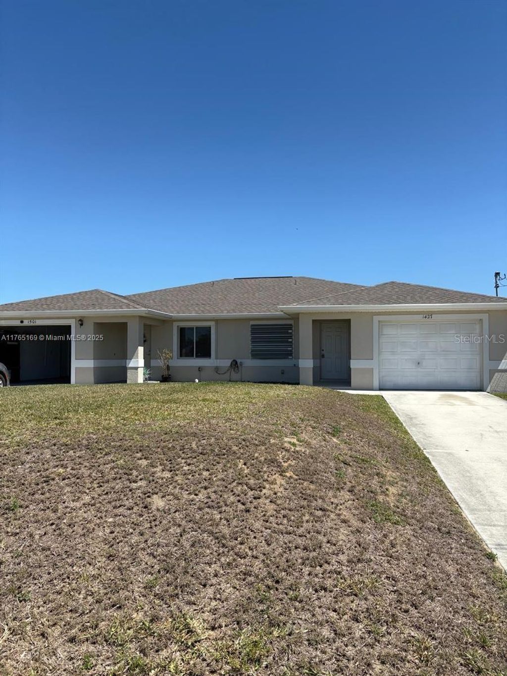 Photo of 1427 NE 8th Place, Cape Coral, FL 33909 (MLS # O6348241)