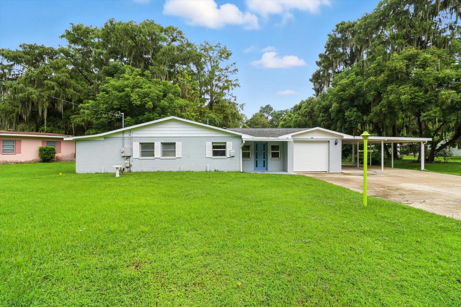 Waterfront Retreat on Inverness Chain of Lakes! Remodeled vintage charm meets modern comfort in this 2BR/2BA lakefront home. Enjoy private dock access, clubhouse with boat ramp, huge double carport, storage buildings, and a spacious backyard. Bring your toys—this property is made for boating, fishing, and Florida fun! Just minutes to downtown Inverness. Your Inverness Lake Escape Awaits! Step into Florida waterfront living at its finest with this beautifully remodeled 2 bedroom, 2 bath vintage retreat. Nestled on the sought-after Inverness Chain of Lakes, this home offers everything you need to relax, entertain, and explore. Bring your boat, kayaks, and fishing poles—the private dock, clubhouse, and boat ramp make it easy to enjoy world-class bass fishing and endless days on the water. With a huge double carport, extra storage buildings, and a large backyard, there’s room for all your toys and gatherings. Inside, you’ll find a warm, updated interior that blends classic character with modern upgrades, creating the perfect year-round residence or weekend getaway. And with downtown Inverness just minutes away, you’ll love the small-town charm, restaurants, and shops right at your fingertips. This isn’t just a home—it’s the lifestyle you’ve been waiting for.