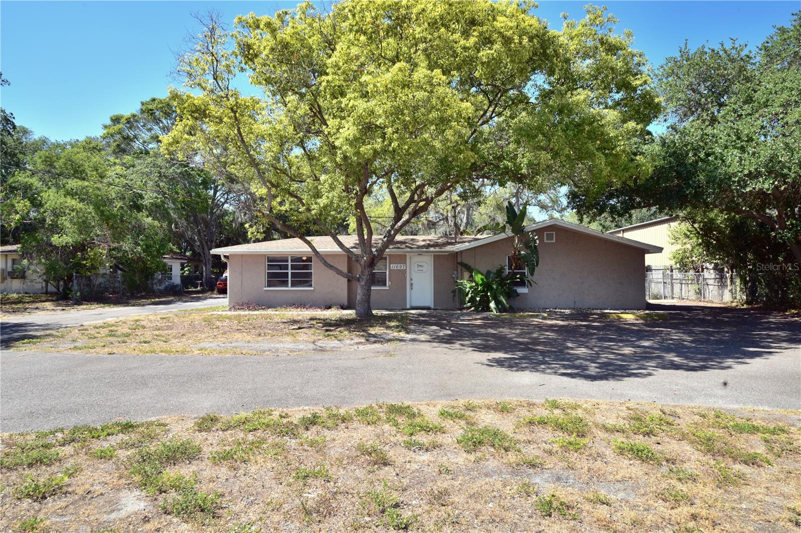 Versatile property located in the Largo/Seminole community on a .46 acre lot zoned E-2 (Employment-2) Commercial. E-2 zoning allows for a multitude of uses including warehousing/storage, offices, recreation, retail, health/fitness, wholesale/distribution and auto repair. The building currently on the property is a 752 sq. ft single family home built in 1955 and remodeled into an office space with a reception area, private office, kitchen with dining area and full bathroom with central heating and air. This property was most recently used for a successful construction company that was in business for 40 plus years and has a variety of potential uses for the future owner. Appraisal completed on property 0n 6/14/2024.