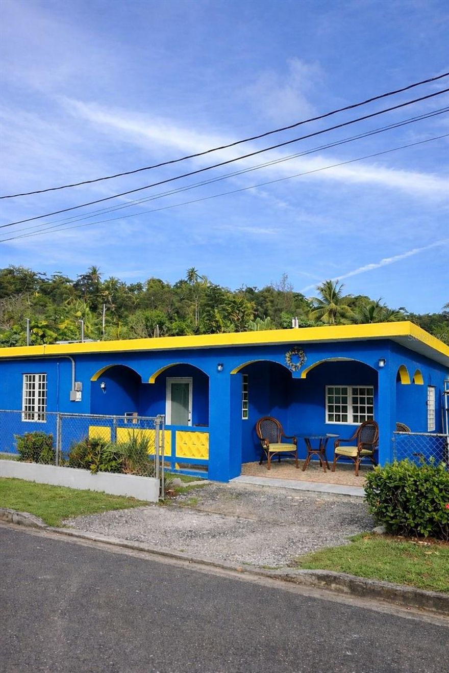 One or more photo(s) has been virtually staged. Welcome to this versatile and well-appointed residence located in the heart of Fajardo, Puerto Rico, just minutes from the coast. This 3-bedroom, 2-bathroom home offers an ideal layout for primary living, a second home, or an income-producing rental property.

One of the bedrooms features a private ensuite bathroom, providing added comfort and privacy. The home boasts an open floor plan that seamlessly connects the living, dining, and kitchen areas, creating a bright and functional space ideal for everyday living and entertaining. Newer split-unit air conditioning systems are installed in every bedroom and the main living area, ensuring year-round comfort.

Enjoy both front and back porch areas, perfect for relaxing or hosting guests. The backyard features mature fruit trees, including banana and plantain, offering a true Caribbean lifestyle experience.

The property is equipped with leased solar panels, which can be assumed by the buyer, helping reduce energy costs. Additional features include a security system, internet and cable readiness, and full utilities in place.

Located on a quiet cul-de-sac with no zoning restrictions, the property allows for short-term rentals such as Airbnb, long-term leasing, or personal use. The beach is only a 15-minute drive away and is also easily accessible by bike or on foot, adding to the home’s lifestyle appeal.

This is a rare opportunity to own a flexible, move-in-ready property in one of Fajardo’s most desirable and accessible locations. 

Call us today!