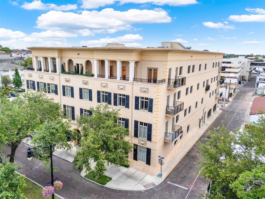 Experience the pinnacle of luxury living in the heart of downtown Winter Park with this stunning penthouse residence at The Landmark—an exclusive enclave of just 13 finely appointed condominiums along Park Avenue’s iconic brick streets. Amid award-winning restaurants, boutique shops, charming sidewalk cafés and art galleries, this elegant condominium offers the ultimate in urban sophistication and convenience. Surrounded by the energy and charm of Park Avenue—recently featured on the Today Show and home to Central Park, the beloved Winter Park Sidewalk Art Festival and countless community events—this residence places you at center of one of Florida’s desirable lifestyle destinations. Meticulously maintained, The Landmark offers a private and serene setting behind a wrought-iron gate that opens to a tranquil central courtyard adorned with a classic fountain and the soft glow of 42 gas lanterns, creating a romantic and inviting ambiance. This penthouse unit, Residence J, features soaring ceilings, abundant natural light, and numerous French doors that open to outdoor terraces with sweeping views of Morse Boulevard and vibrant streetscape below. Inside, the open concept living and dining spaces are centered around a gas fireplace and flow seamlessly into a well-appointed chef’s kitchen complete with integrated appliances, gas range, breakfast nook and ample counter space for casual meals and entertaining. The primary suite offers exceptional comfort with dual vanities, dual water closets, a large walk-in shower and a custom walk-in closet. Bedroom two features access to a Jack and Jill bath, while bedroom three offers its private en suite and a Juliet balcony—an ideal perch for taking in the city’s charm from above. Additional highlights include two deeded underground parking spaces, a climate-controlled private storage room, and access to a shared summer kitchen and courtyard gathering space, ideal for morning coffee or sunset cocktails with neighbors. Whether you're a local urban dweller, a seasonal resident or a global traveler seeking a lock-and-leave lifestyle, this rare offering at The Landmark delivers an unmatched combination of luxury, location and lifestyle in one of Central Florida’s celebrated communities.