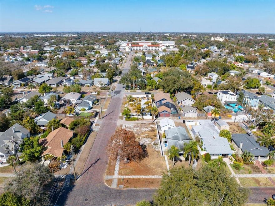 An exceptional opportunity to build in the heart of St. Petersburg's beloved Historic Kenwood-just a short stroll to the vibrant Grand Central District,  This cleared and buildable corner lot sits on a picturesque brick street, surrounded by charming 1920's - 1950's architecture and mature tree-lined streets that define one of the City's most treasured neighborhoods. With the lot already cleared, the next owner can begin the design and construction process immediately.