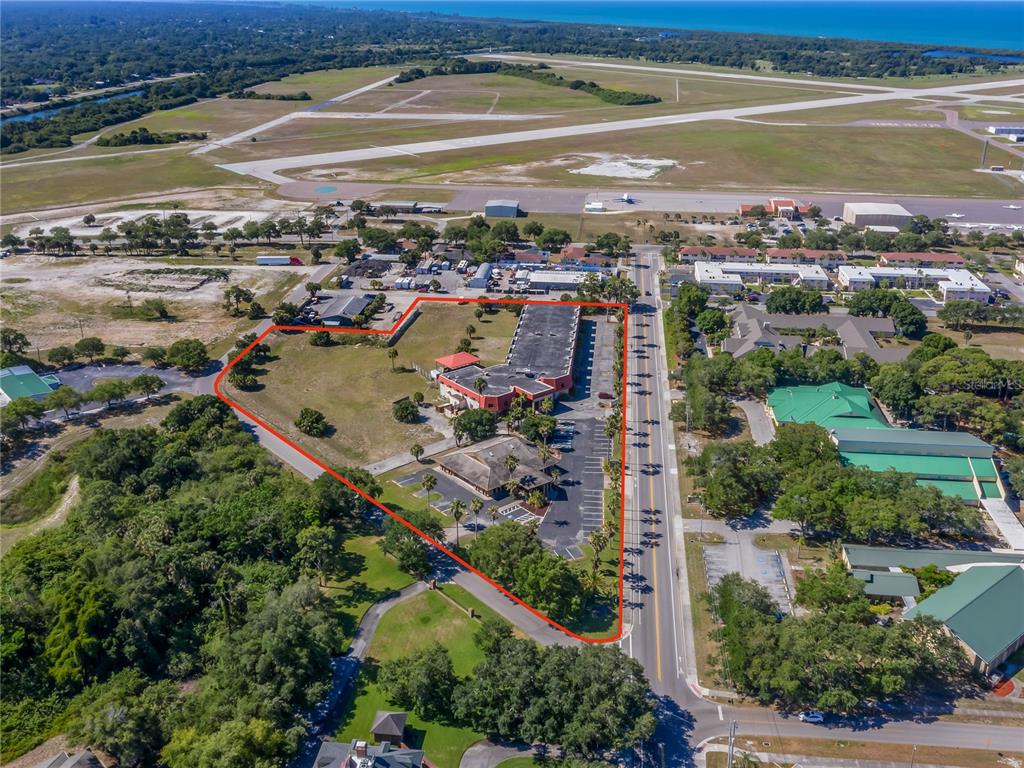 EXCEPTIONAL DEVELOPMENT OPPORTUNITY on the Island in Venice, Florida. LAND & BUILDINGS! This is one of the last, largest and best pieces of available land on the island. This popular destination is home to a private airport, marina, beautiful beaches and beachfront properties and a charming downtown area with local restaurants and shops. This property consists of approx. 5.15 acres located in the heart of it all with easy access off the south bridge to Hwy-41 (Tamiami Trail). Currently zoned RTR Resort residential, previous plans proposed for up to 165 units in a combination of short-term and extended stay hotel/resort/and restaurant. A rezoning to RMF4 indicates 18 units per acre density for luxury condos which are in high demand on the island. Under either buildout scenario upper floors would showcase stunning sunsets over the Gulf of Mexico! Property encompasses 1111 and 1225 Avenida Del Circo and included in the purchase is a beautiful Professional Building with a long established dermatology center. At buyer's discretion tenants are happy to stay and annual income in the range of $120,000 per year can be expected. Alternatively, this building would accommodate a very nice sales center, amenities center and more. The second existing building offers approximately 50,000 sf. with 65+ existing rooms, management offices, a full restaurant with large commercial kitchen and more. This building could be renovated to current apartments, assisted living, hotel, condos etc. This rare opportunity is the first time to market in almost 40 years. This property is ready for your dream...build it and they will come.