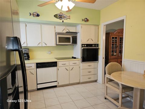 Photo of 2440 World Parkway Boulevard #46, Clearwater, FL 33763 (MLS # TB8503314)