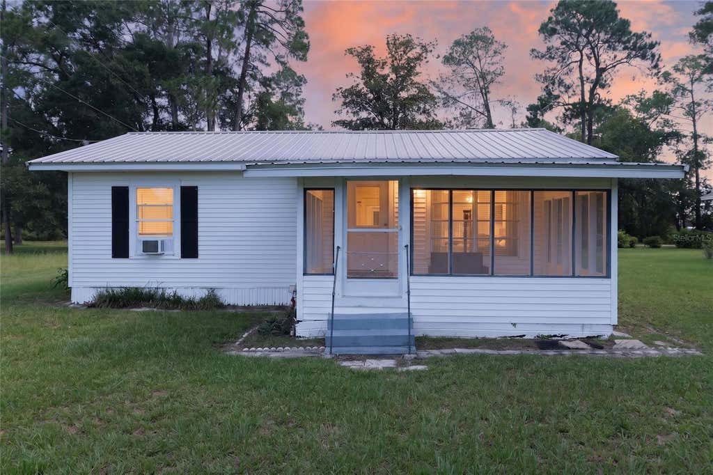 Photo of 148 Lake Shore Terrace, Interlachen, FL 32148 (MLS # GC541792)