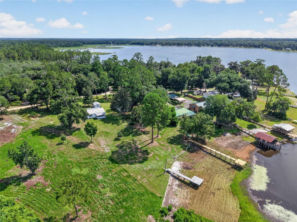 Photo of 148 Lake Shore Terrace, Interlachen, FL 32148 (MLS # GC541792)