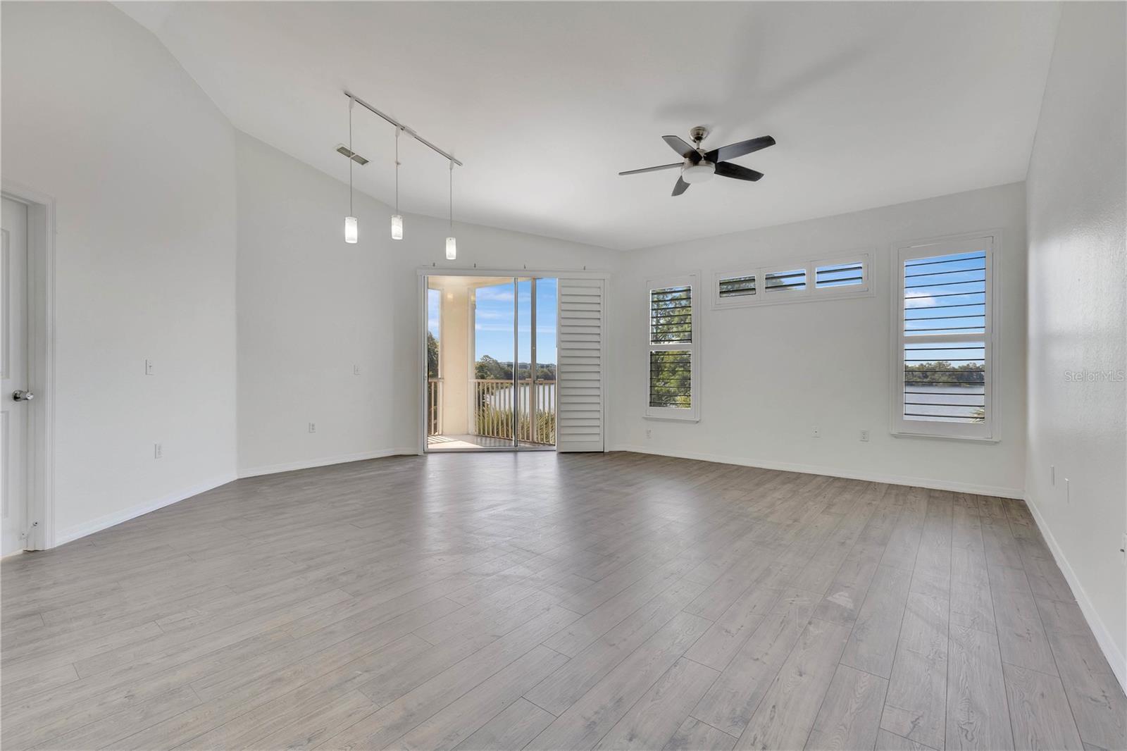 Private Garage AND Carport included. Vaulted Ceilings and a split floor-plan. Overlooking Lake Shadow and renovated from head to toe with Brand New Appliances. The community has an absolutely gorgeous resort-style swimming pool, private fitness center and and outdoor basketball court with trails to walk your pet both on the lake and around the many ponds nestled within.