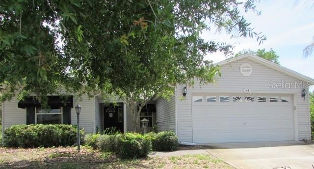 Photo of 1142 Meadowbend Drive, Leesburg, FL 34748 (MLS # G5113417)