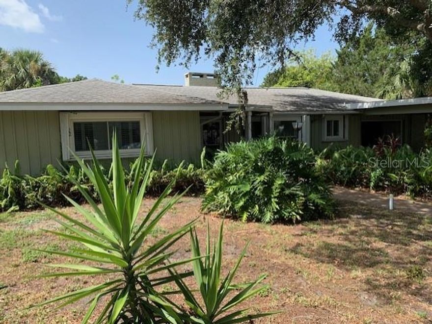 Wonderful location single family pool home on quiet street.  Bay is so close you can easily enjoy the Bay front minutes away on adjoining UPLANDS. Plenty of room to move around. One car garage best for storage and laundry hookup covered car port for one.  Plenty of mature trees and lush landscape.  No deed restrictions only county restrictions.  Owner pays for pool care.  Tenant responsible for lawn care. 
Water is included, tenant pays electric. You will love the dead end street, the huge yard wonderful for you favorite pet.  Newer windows, plenty of remodeled homes on the street.  Close to downtown.  Ready for move in there is exterior improvements being made now.  Tenant can stay multiple years if desired.