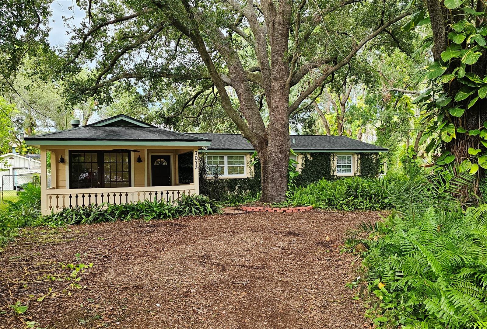 This beautifully remodeled, move-in-ready home is packed with features and ready for its next owner. It has a spacious master bedroom with an en-suite bathroom and a large walk-in closet. Outside, you’ll find a large detached porch with big storage, perfect for storing a golf cart, bikes, kayaks, or motorcycles—or transform it into a bedroom, gym, or office or a party place . The backyard is a standout, surrounded by trees that keep the home cooler and energy bills lower. It’s perfect for relaxing or entertaining. Located in a quiet and friendly . Enjoy gorgeous sunsets or cast a line off the nearby pier at one of the area’s best parks. Buyer and/or buyers agent to verify all room sizes.