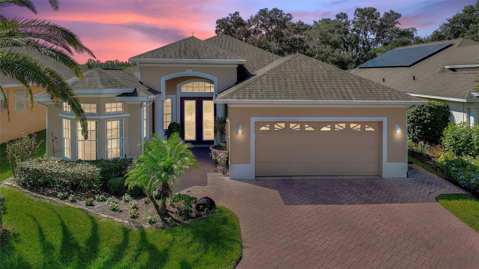 One or more photo(s) has been virtually staged. Mostly Furnished Water-Front RidgeBrooke 3/2/Family Room/Den model with a 481 SF west-facing Florida Room Overlooking the Pond between High Vista and Del Webb 55+ communities, located 0.2 miles from High Vista's private clubhouse and amenity center. List Price is below 2024 independent appraisal which also cited an effective age of this property as 8 years. Expanded brick paver driveway and walkway to the 8 FT leaded-glass double front doors with adjacent water fountain adorned by cherubs. 12 FT ceiling in central Great Room with 2 skylights and full-view patio doors to Florida Room with skylight and 3 walls of sun-shaded windows. Widened galley kitchen has solid wood cabinets, stainless-steel appliances, custom tile backsplash, solid-surface breakfast bar and countertops with seamless sink and a closet pantry. Adjacent family room with tray ceiling and dining area has western water view. 8 FT double doors to primary en suite bedroom with dual closets, tray ceiling and updated full bathroom with shower, linen closet and separate steam room. Split bedroom design offers privacy to guests with a full bath and linen closet between 2 guest bedrooms. Bay window elevation in front Den. Custom crown molding in many rooms. 2024 Water Heater. 2014 Roof. 2020 & 2013 HVAC units, both serviced annually. 4-Point Inspection dated 9/24/25 is available for view upon request. ALL COMPLETE WRITTEN OFFERS WILL BE PRESENTED TO SELLER ON 11/5/2025. Sold As-Is. Ridgewood Lakes is a golf cart friendly community. $230 monthly High Vista HOA fee includes Spectrum internet and basic cable TV with 2 cable boxes, lawn mowing and exclusive access to resident-owned 12,000 SF private High Vista clubhouse and amenities. $425 semi-annual Ridgewood Lakes HOA fee provides 24x7 staffed security gate and master association-owned private road maintenance. Adjacent to 18-hole White Heron Golf Club with The Nest restaurant, privately owned and open to the public. High Vista is a 55+ community with outdoor heated pool and spa, fitness center, library, pub & many organized activities. Pickle ball, tennis, bocce and shuffleboard courts. Miles of biking and walking trails within Ridgewood Lakes gated community. Shopping, Disney, Universal, Orlando & Central FL entertainment nearby, easy access to I-4, medical facilities, airports & Sunrail Station. Advent Health hospital is 3 miles away.