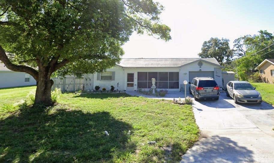 Photo of 2048 Waterfall Drive, Spring Hill, FL 34608 (MLS # J1003575)