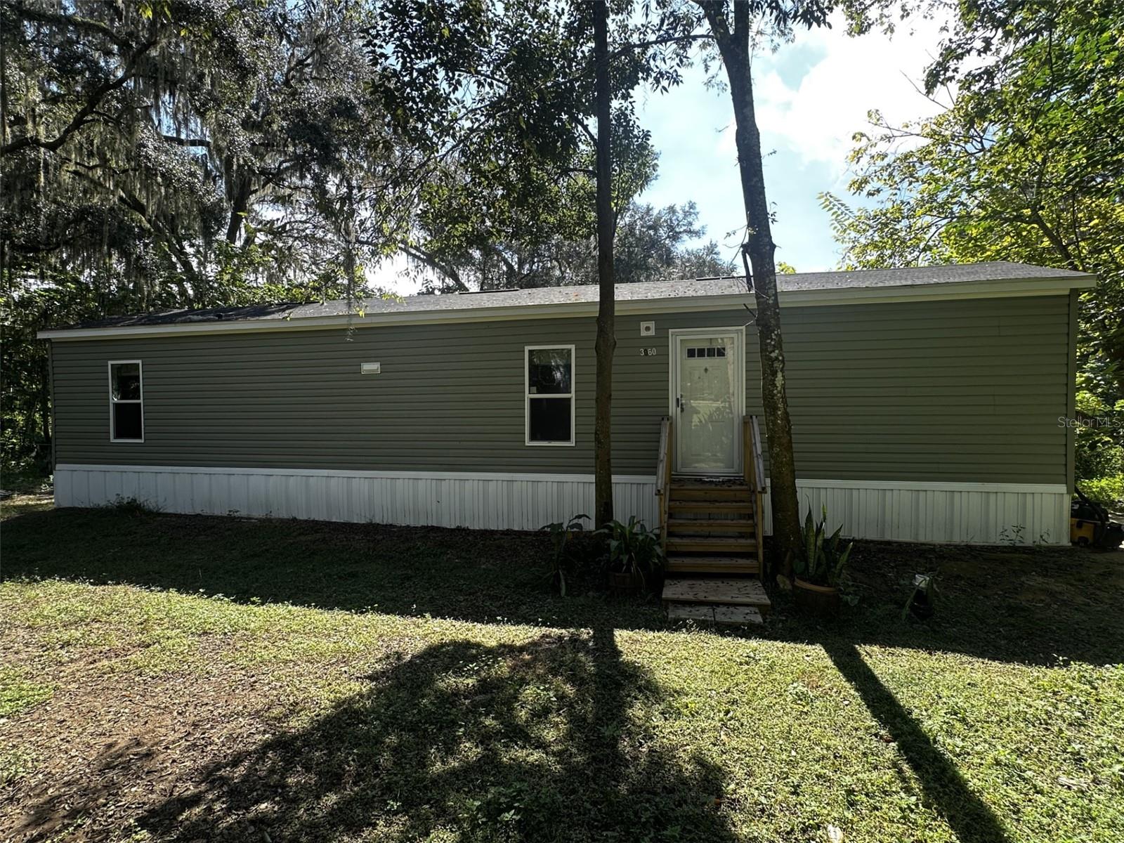 Welcome Home to 3060 SE 48th St, Ocala, FL! This brand-new 2-bedroom, 2-bath manufactured home offers modern living in a peaceful Marion County setting. Located in desirable SE Ocala, this home features an open-concept floor plan, energy-efficient design, and brand-new appliances for a truly move-in ready experience. Enjoy spacious bedrooms, stylish finishes, and a bright kitchen that flows seamlessly into the living area perfect for entertaining or relaxing. The large lot provides plenty of outdoor space for gardening, pets, or weekend gatherings. Conveniently located near shopping, dining, medical centers, and top-rated schools, this home combines affordability, comfort, and convenience. Whether you're a first-time buyer, investor, or looking to downsize, this new Ocala mobile home is an ideal choice for low-maintenance Florida living.