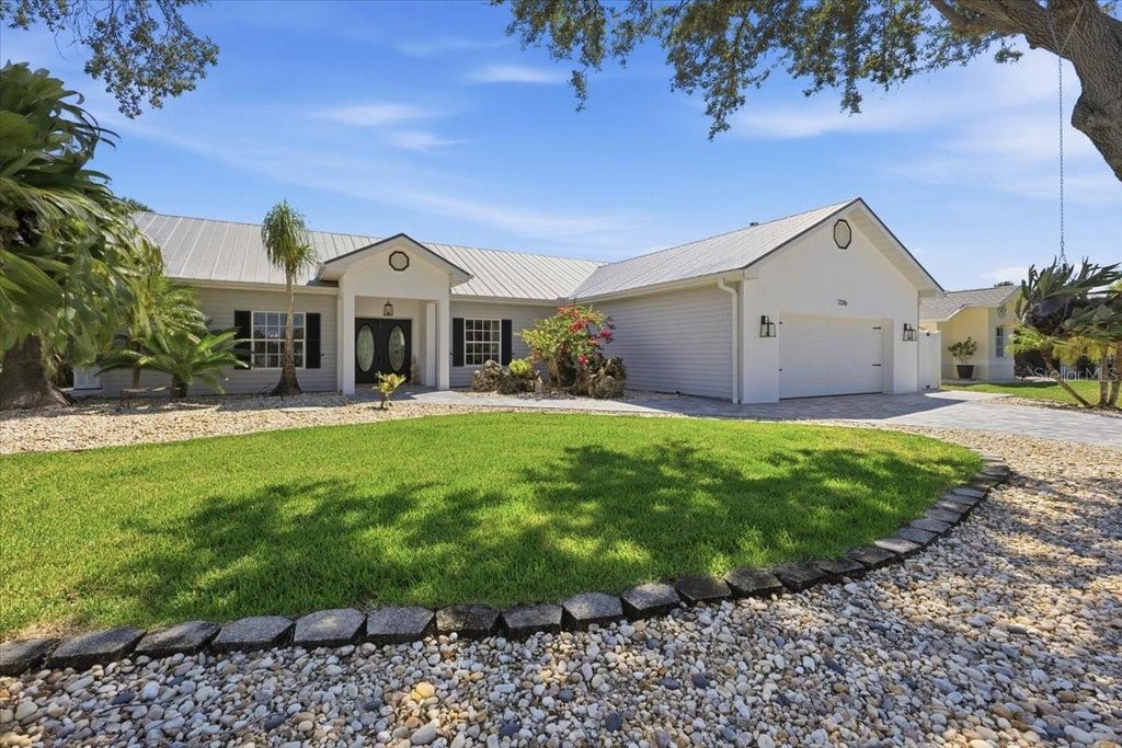 Photo of 7376 Memorial Drive, Port Charlotte, FL 33981 (MLS # D6149159)