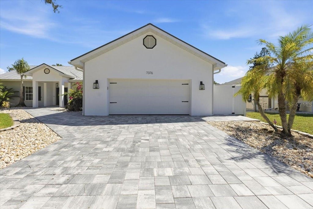 Photo of 7376 Memorial Drive, Port Charlotte, FL 33981 (MLS # D6149159)