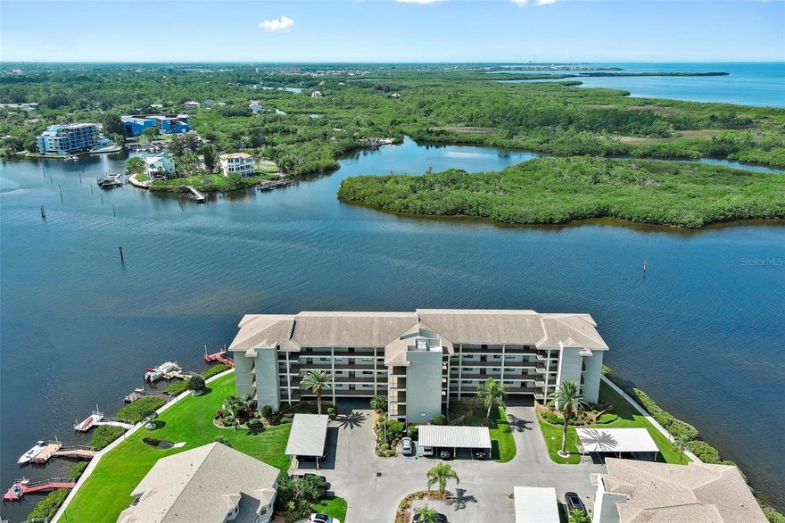 This waterfront condo is located in the much desired SAND PEBBLE gated community. The community is well maintained and has so much to offer. 24 hour gate guard, waterfront boardwalk, new clubhouse with fitness, library, game tables, card room, tennis, pickleball and multiple pools with cabanas and gas grills. This condo offers gorgeous views of the Cotee River from almost every window with partial Gulf view as well. Updated kitchen, great room with waterfront view and sliding door access to the enclosed lanai, updated baths, large guest bedroom, master bedroom with access to the enclosed lanai, vanity, walk in closet and en suite bath with walk in shower. AC new in 2021, Washer and Dryer new in 2022. Sliding doors are storm rated. One under building parking space reserved and storage locker. SAND PEBBLE is close to waterfront dining, historic downtown restaurants, theatre, night life, Sims Park (festivals and activities), approx 20 min to Tarpon Springs Sponge Docks and Fred Howard Park, approx 40 min to Caladesi Island and Honeymoon Island, approx 60 min to famous Clearwater Beach, approx 60 min to Tampa airport, Tampa Cruise port, Sports Arenas, Theatre, Theme Parks, Nightlife and Shopping! NO PETS. NO SMOKING. NOT AGE RESTRICTED. Rent includes: trash, cable, internet, use of grounds and amenities. Call to schedule your private showing. This one will not last long.