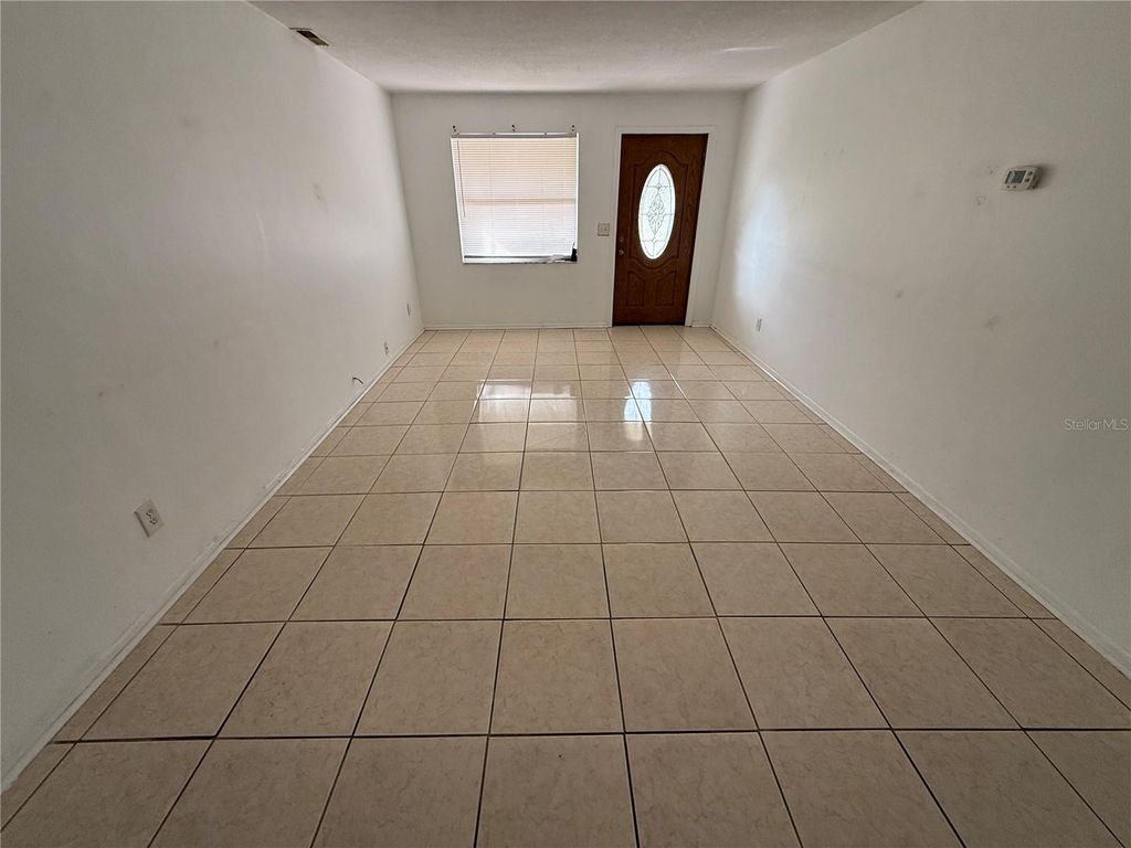 Photo of 1270 8th Avenue NE, Largo, FL 33770 (MLS # TB8472804)