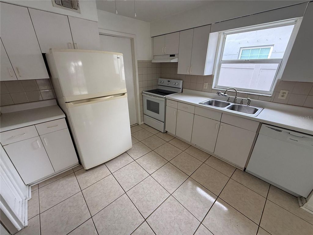 Photo of 1270 8th Avenue NE, Largo, FL 33770 (MLS # TB8472804)