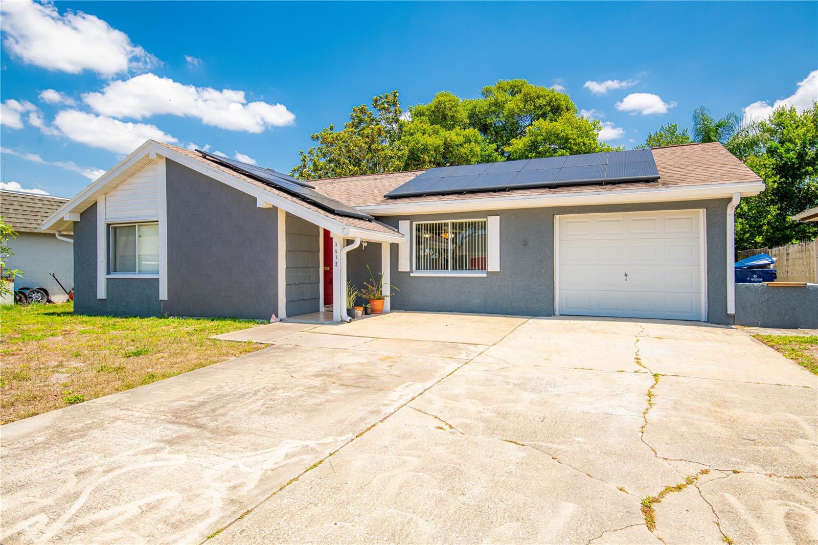 This beauty is ready for you to call it home. It is located just off Moog RD in Holiday, FL. 3512 Edenwood is a two-bedroom, two-bath, single-family home ready for move-in. This home offers a kitchen that opens to the family and dining room. There is a large enclosed lanai that garners access to the backyard. This home has solar panels to offer you a lower electric bill. The extended driveway leads to a single-car garage with interior access to the house! Bring your boat and other water toys, as this home is MINUTES from the Gulf of Mexico. Schedule your tour today!