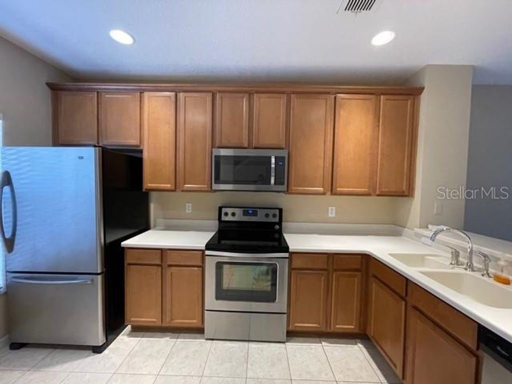 Photo of 9327 Flowering Cottonwood Road #23, Orlando, FL 32832 (MLS # O6357554)