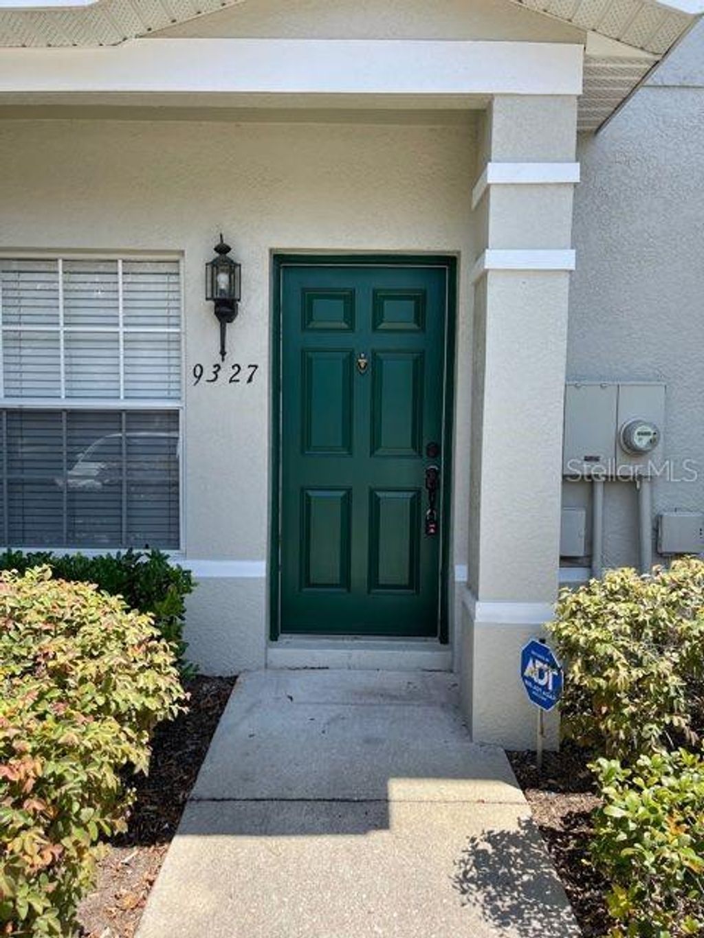 Photo of 9327 Flowering Cottonwood Road #23, Orlando, FL 32832 (MLS # O6357554)
