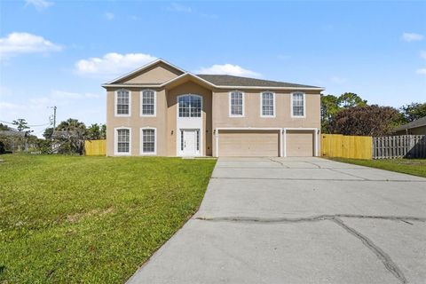 Photo of 198 Naftal Avenue NW, Palm Bay, FL 32907 (MLS # O6400103)