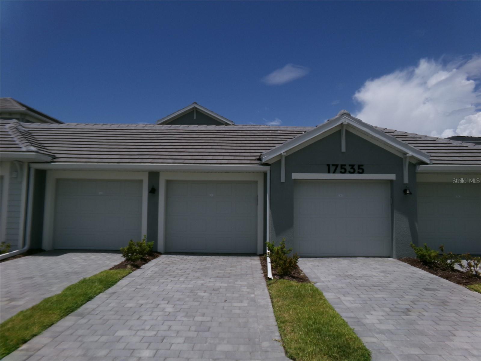 This VERANDA III CONDO with DEEDED GOLF BUNDLE is available for immediate occupancy! This second Floor Unit,#205, has a view of the 5th hole from the Tee Box to the green. Your Detached 1 Car Garage is steps away to the right of the unit rather than in front of with rear entry door access for your convenience. Golf Membership entitles the Homeowners the Family benefits of two golf memberships which is no longer available with the to be built, Veranda Condo Builds. This unit has 2 bedrooms, 2 bathrooms and a Large Den with French Doors and is in walking distance to 2 Satellite pools. This spacious floor plan boasts HURRICANE IMPACT WINDOWS/DOORS, a Chef Kitchen with large island with Quartz Countertops, Shaker Style Cabinets, and Stainless Steel Appliances and large pantry that all flows into the living and dining area. Adjacent to the Family Room and Kitchen is an additional, private Den/office, additional space for guests and/or another TV room. The Owner's Suite with a window view to the Rear Covered Lanai Area and the entire 5th Hole. The en-suite bathroom has dual sinks with quartz countertops and a walk in shower. The second bedroom also has a window view to the covered Front Lanai Area and a spacious built in closet. The second bathroom has a shower/bathtub combination and a quartz countertop vanity. The exclusive 18-hole Wellen Park Golf and Country Club is highly coveted for its guard-gated entrance and resort style amenities including a Laguna Pool with Tiki Bar, additional Satellite Pools, a Day Spa, a Dog Park, Pickle-ball Courts, Bocce Ball, and Tennis Facilities. Wellen Park is Golf Cart and Dog Friendly with close proximity to nearby gulf beaches, airports, local attractions and a short distance to Downtown Sarasota and Venice. Downtown Wellen Park has weekly music venues, local eateries, a large lake with walking trails and E-bike rentals, Kayak and Paddle board rentals, weekly Farmer's Markets and more. HOA fee includes cable, internet, water, sewer, trash pickup, gated community, and building exterior maintenance.