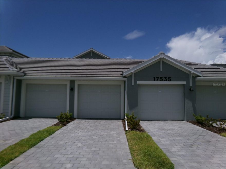 This VERANDA III CONDO with DEEDED GOLF BUNDLE is available for immediate occupancy! This second Floor Unit,#205,  has a  view of the 5th hole from the  Tee Box to the green. Your Detached 1 Car Garage is steps away to the right of the unit rather than in front of with rear entry door access for your convenience. Golf Membership entitles the Homeowners the Family benefits of two golf memberships which is no longer available with the to be built, Veranda Condo Builds. This unit has 2 bedrooms, 2 bathrooms and a Large Den with French Doors and is in walking distance to 2 Satellite pools. This spacious floor plan boasts HURRICANE IMPACT WINDOWS/DOORS, a Chef Kitchen with large island with Quartz Countertops, Shaker Style Cabinets, and Stainless Steel Appliances and large pantry that all flows into the living and dining area. Adjacent to the Family Room and Kitchen is an additional, private Den/office, additional space for guests and/or another TV room. The Owner's Suite with a window view to the Rear Covered Lanai Area and the entire 5th Hole.  The en-suite bathroom has dual sinks with quartz countertops and a walk in shower.  The second bedroom also has a window view to the covered Front Lanai Area and a spacious built in closet. The second bathroom has a shower/bathtub combination and a quartz countertop vanity.  The exclusive 18-hole Wellen Park Golf and Country Club is highly coveted for its guard-gated entrance and resort style amenities including a Laguna Pool with Tiki Bar, additional Satellite Pools, a Day Spa, a Dog Park, Pickle-ball Courts, Bocce Ball, and Tennis Facilities. Wellen Park is Golf Cart and Dog Friendly with close proximity to nearby gulf beaches, airports, local attractions and a short distance to Downtown Sarasota and Venice. Downtown Wellen Park has weekly music venues, local eateries, a large lake with walking trails and E-bike rentals, Kayak and Paddle board rentals, weekly Farmer's Markets and more. HOA fee includes cable, internet, water, sewer, trash pickup, gated community, and building exterior maintenance.