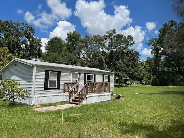 Neat as a pin! Fully furnished mobile home on nearly 1/2 acre in walking distance to schools and downtown. Lease can be for less than one year if necessary. Recently completely remodeled. Newer appliances with washer and dryer included.