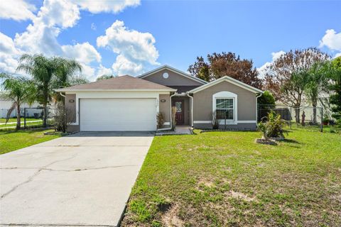 Photo of 1923 Manatee Drive, Poinciana, FL 34759 (MLS # O6410239)