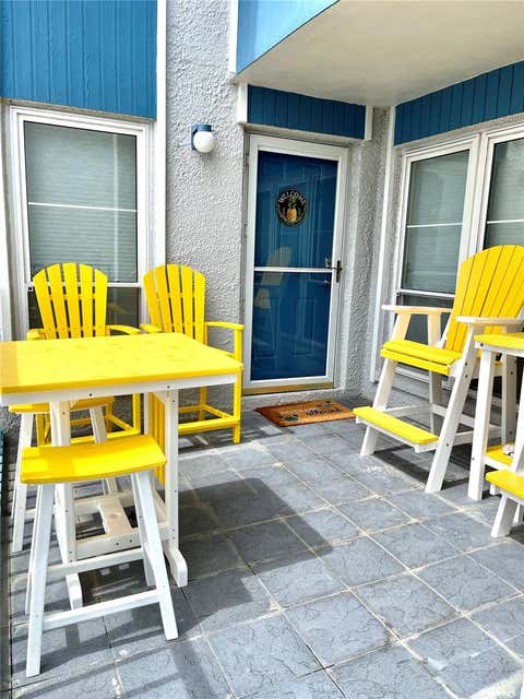Photo of 315 Medallion Boulevard #H, Madeira Beach, FL 33708 (MLS # TB8529075)
